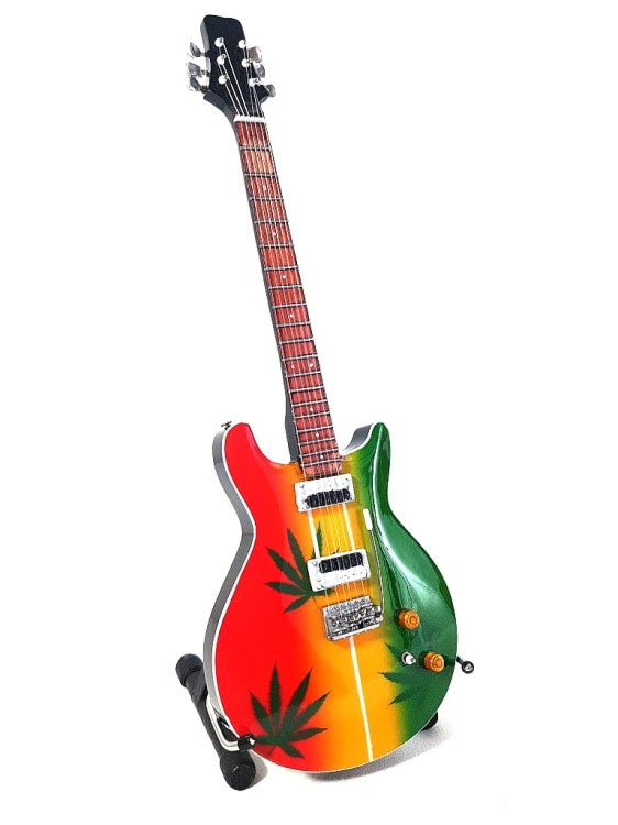 Miniaturowa gitara Bob Marley sprawdzi się jako dekoracja pokoju muzycznego, studia lub półki kolekcjonera.
