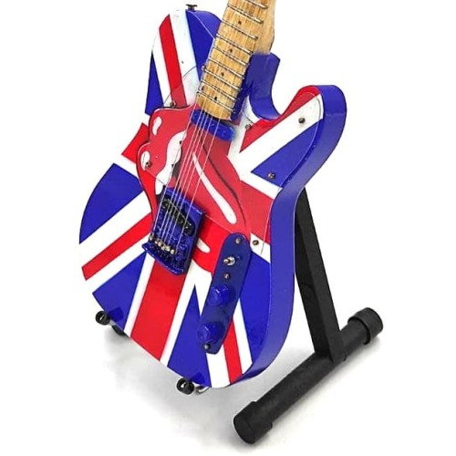 Kolekcjonerska mini gitara ma grafikę UK &amp; Tongue oraz starannie odwzorowany kształt instrumentu.