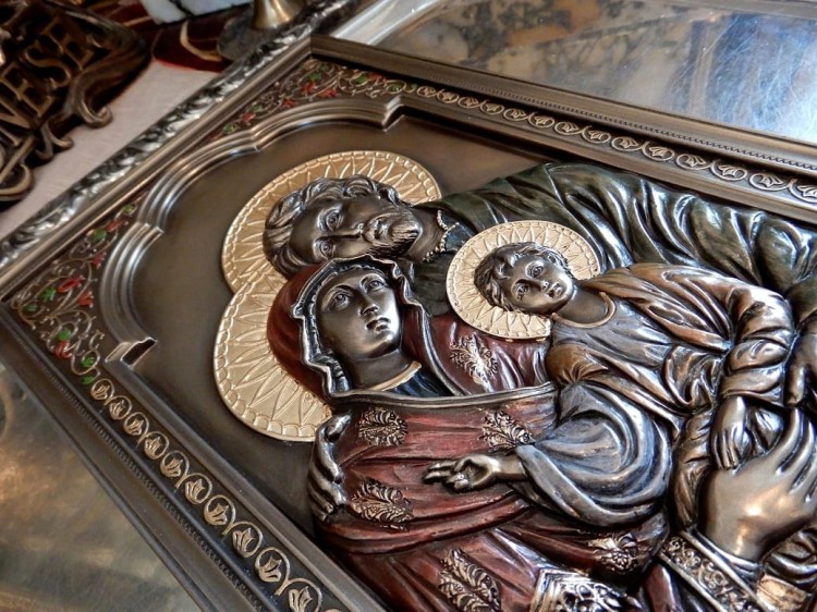Maryja, Józef i Dzieciątko Jezus na ozdobnej ikonie ściennej Veronese.