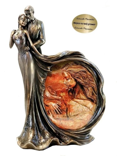 Figurka z parą młodą i ramką na zdjęcie dla nowożeńców na ślub