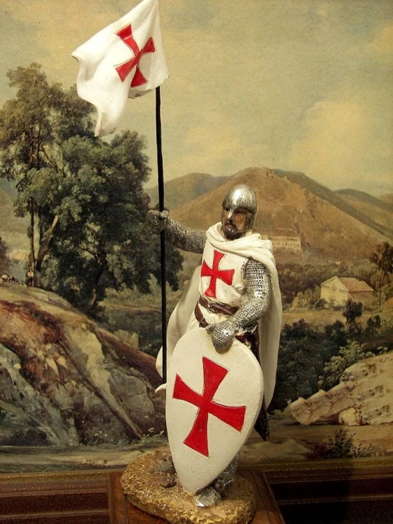 krzyże maltańskie na tarczy, chorągwi i zbroi