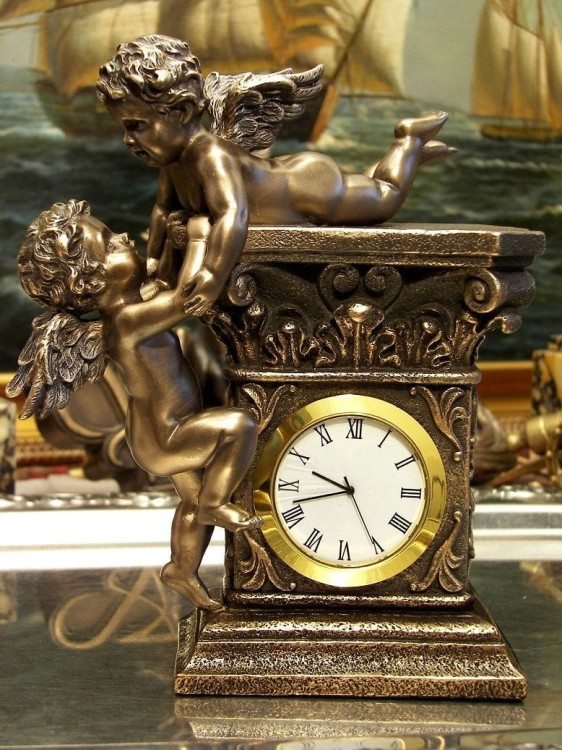 zegar barokowy z amorkami