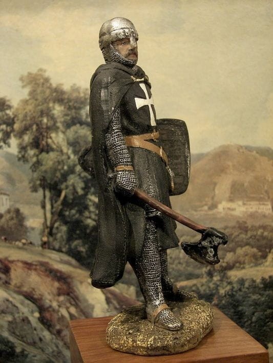 Rycerz w zbroi z toporem i tarczą